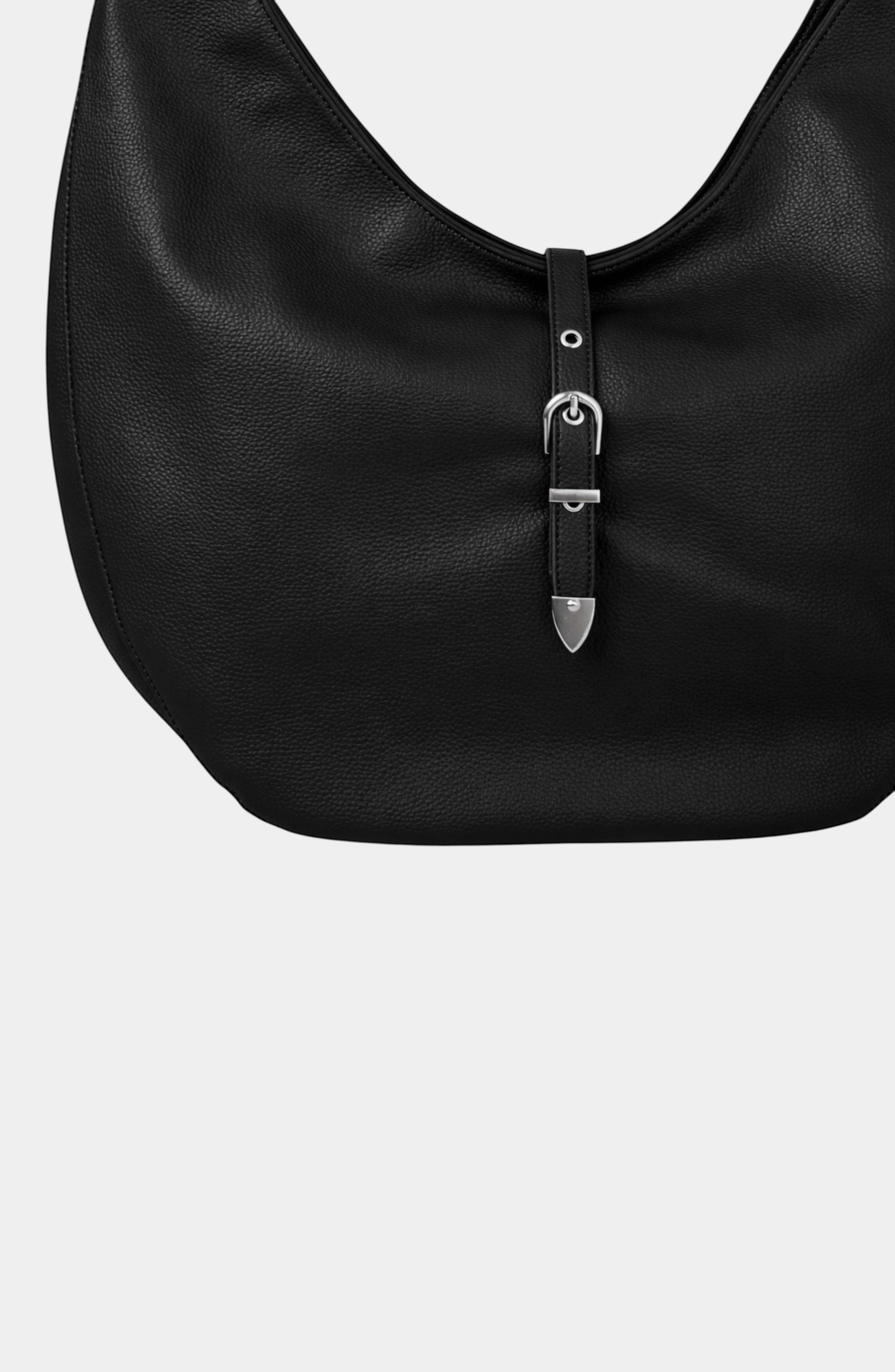 Urban Originals USA Lighthouse black hobo bag in pebbled vegan leather with a silver buckle strap detail.